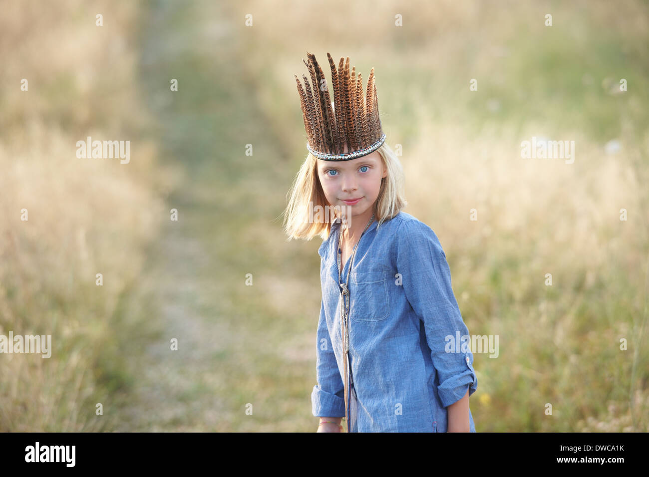 Portrait of girl in native american headdress Stock Photo