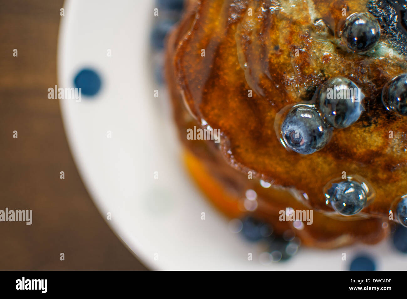 Still life overhead view of blueberry pancakes with maple syrup Stock Photo
