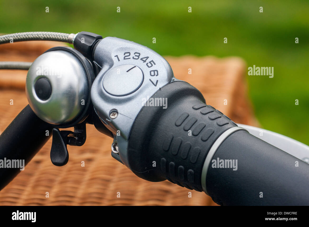 Close up of bike bell and grip shift / shifter on handlebar of pedelec / e-bike / electric bicycle Stock Photo