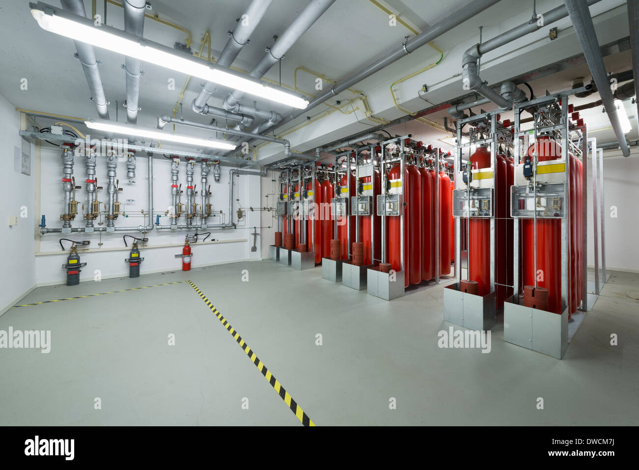 Fire extinguisher system, data storage in data warehouse Stock Photo