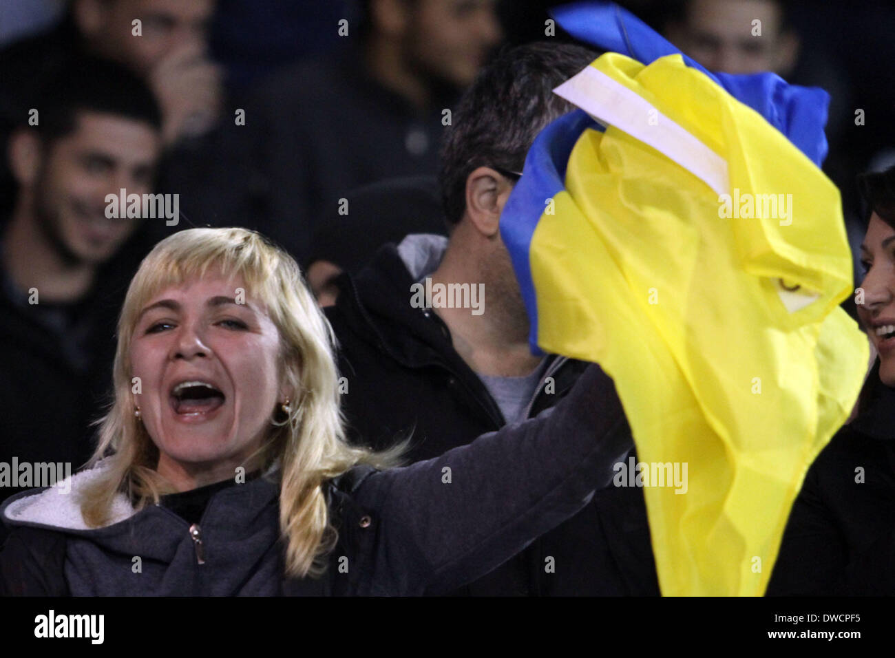 Cyprus, Larnaka- March 05,2014: Ukraine's fans cheer  during the friendly game  between Ukraine  and USA at the Antonis Papadopoulos  stadium in Larnaka on March  05,2014 Credit:  Yiannis Kourtoglou/Alamy Live News Stock Photo