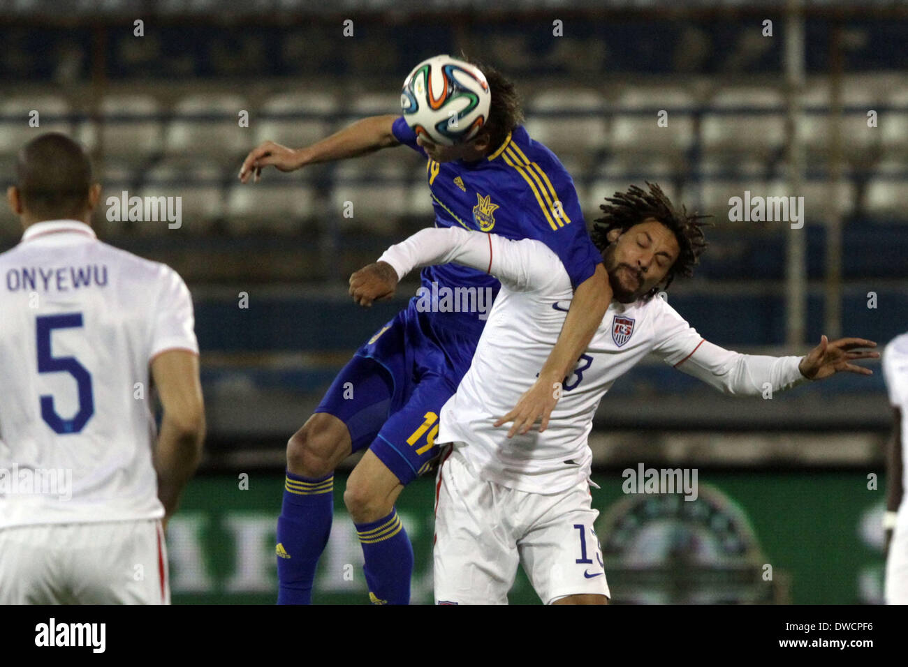 Cyprus, Larnaka- March 05,2014: Ukraine's Denys Garmash   fight  for the ball with USA's jERMAINE jONES during the friendly game  between Ukraine  and USA at the Antonis Papadopoulos  stadium in Larnaka on March  05,2014 Credit:  Yiannis Kourtoglou/Alamy Live News Stock Photo