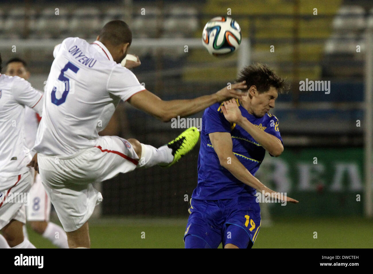 Cyprus, Larnaka- March 05,2014: Ukraine's Denys Garmash   fight  for the ball with USA's Oguchi  Onyewu during the friendly game  between Ukraine  and USA at the Antonis Papadopoulos  stadium in Larnaka on March  05,2014 Credit:  Yiannis Kourtoglou/Alamy Live News Stock Photo