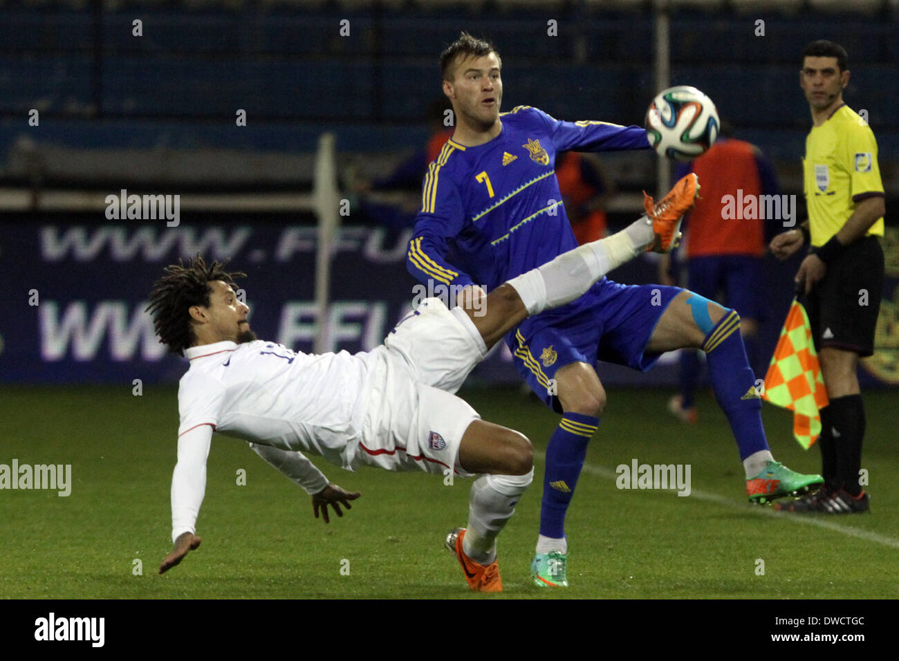 Cyprus, Larnaka- March 05,2014: Ukraine's Andriy Yarmolenko fight  for the ball with USA's Jermaine Jones  during the friendly game  between Ukraine  and USA at the Antonis Papadopoulos  stadium in Larnaka on March  05,2014 Credit:  Yiannis Kourtoglou/Alamy Live News Stock Photo