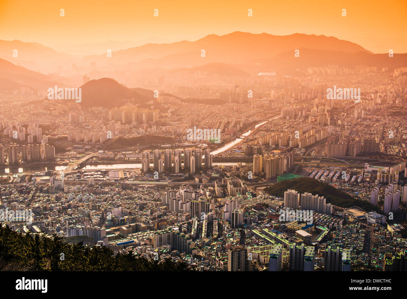 Busan, South Korea hazy sunset skyline. Stock Photo