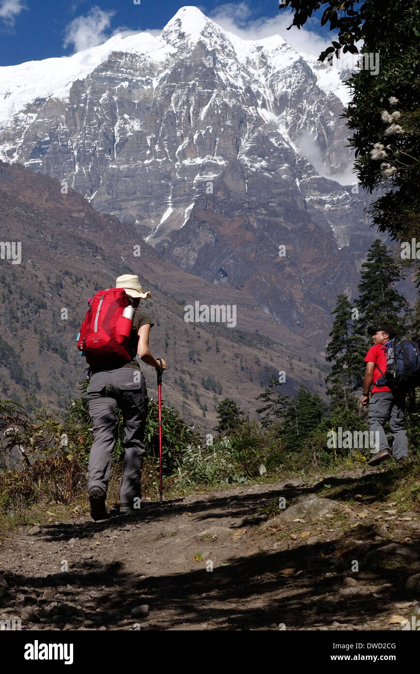 Trekkers on the Manaslu Circuit trail in Nepal. Stock Photo
