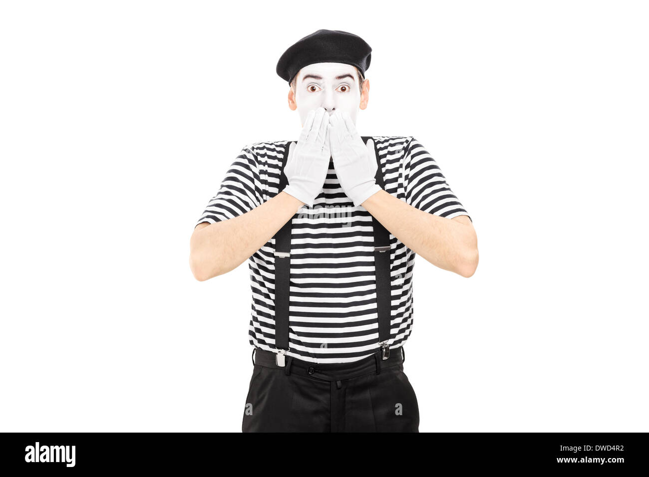 Shocked mime artist standing in disbelief Stock Photo