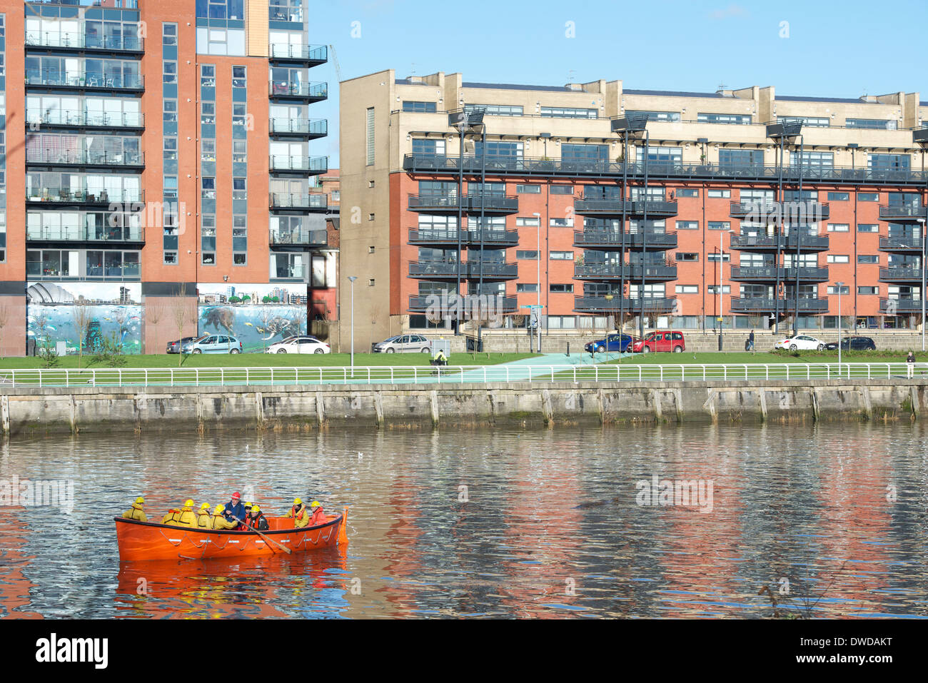 A class from the City of Glasgow College on the river at Clyde Street, Glasgow. Stock Photo