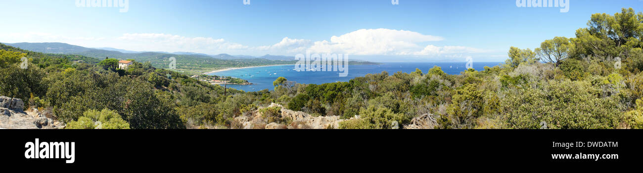 Panoramic view of Plage de Pampelonne Les Salines St Tropez France with luxury yachts and green hills Stock Photo
