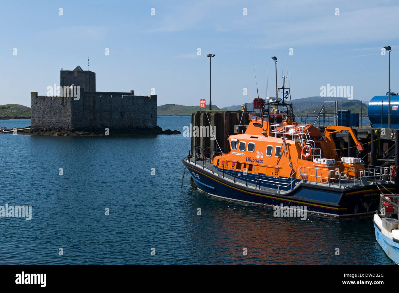 Kisimul Castle and the lifeboat from the harbour, Castlebay, Isle of Barra, Western Isles, Scotland. Stock Photo