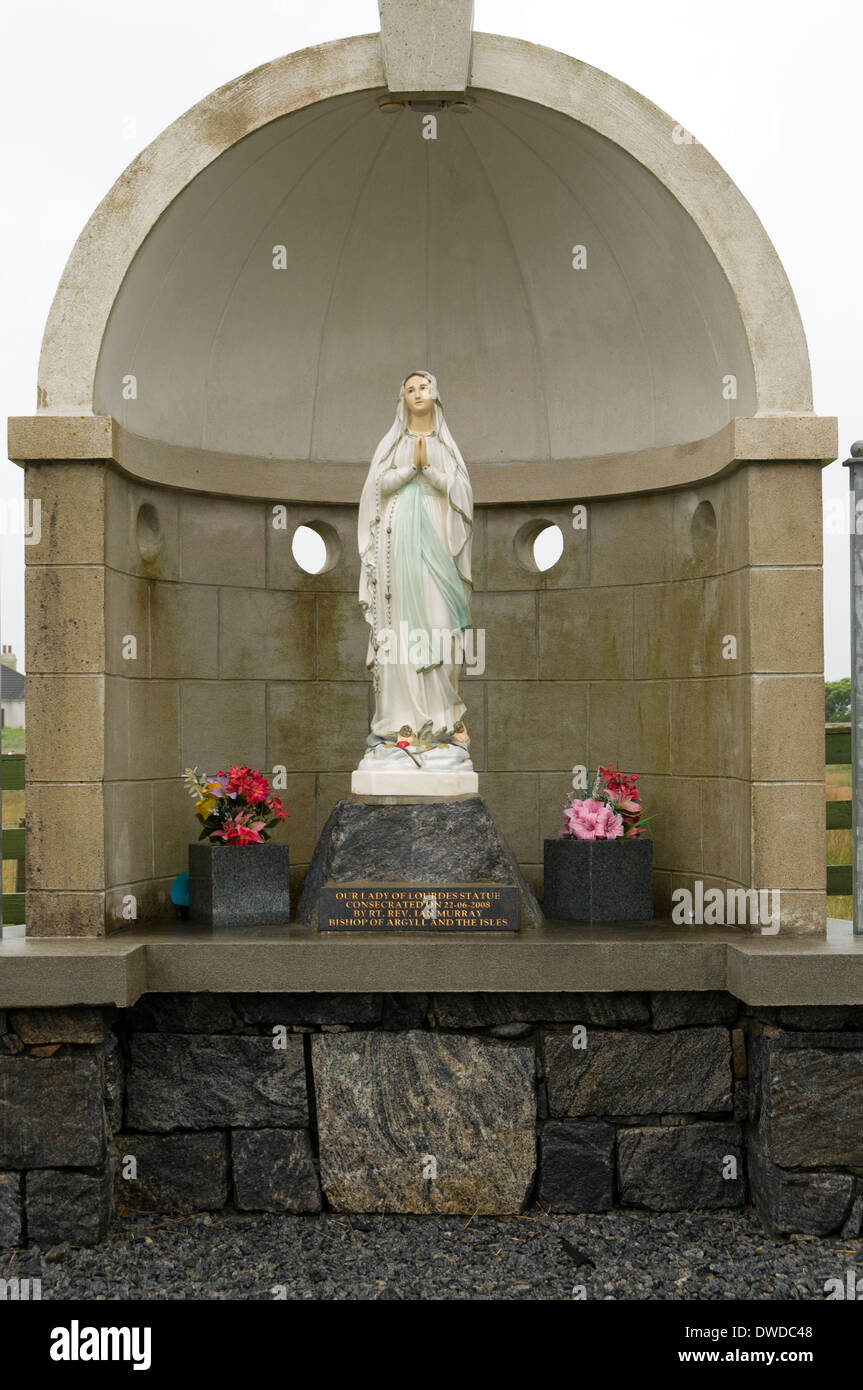 Statue of 'Our Lady of Lourdes' in an outdoor roadside chapel, South