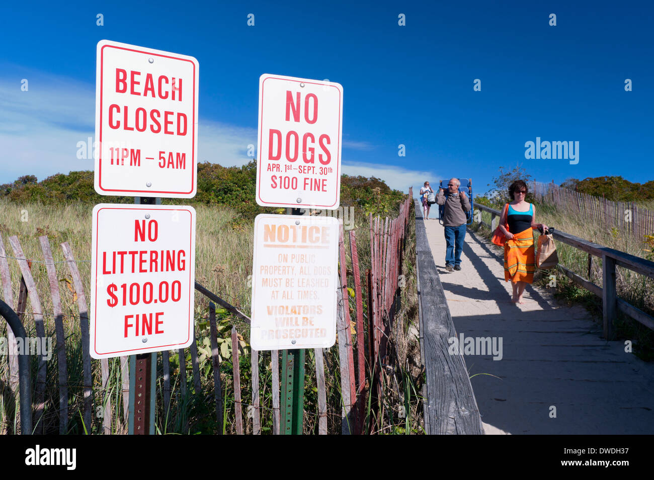 Regulatory signs at walkway to Ogunquit Beach, Maine, USA. Stock Photo