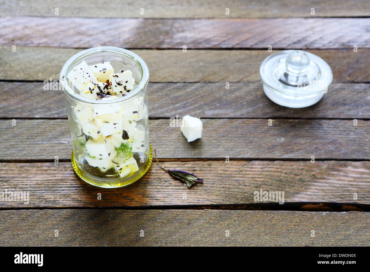 marinated feta in a jar, food closep Stock Photo Alamy
