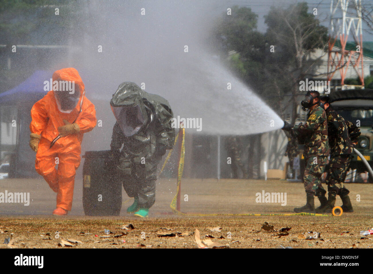 Quezon City, Philippines. 6th Mar, 2014. Soldiers from the Philippine Army participate in the Chemical, Biological, Radiological, and Nuclear Explosive (CBRNE) capability demonstration at Camp Aguinaldo in Quezon City, the Philippines, March 6, 2014. Credit:  Rouelle Umali/Xinhua/Alamy Live News Stock Photo