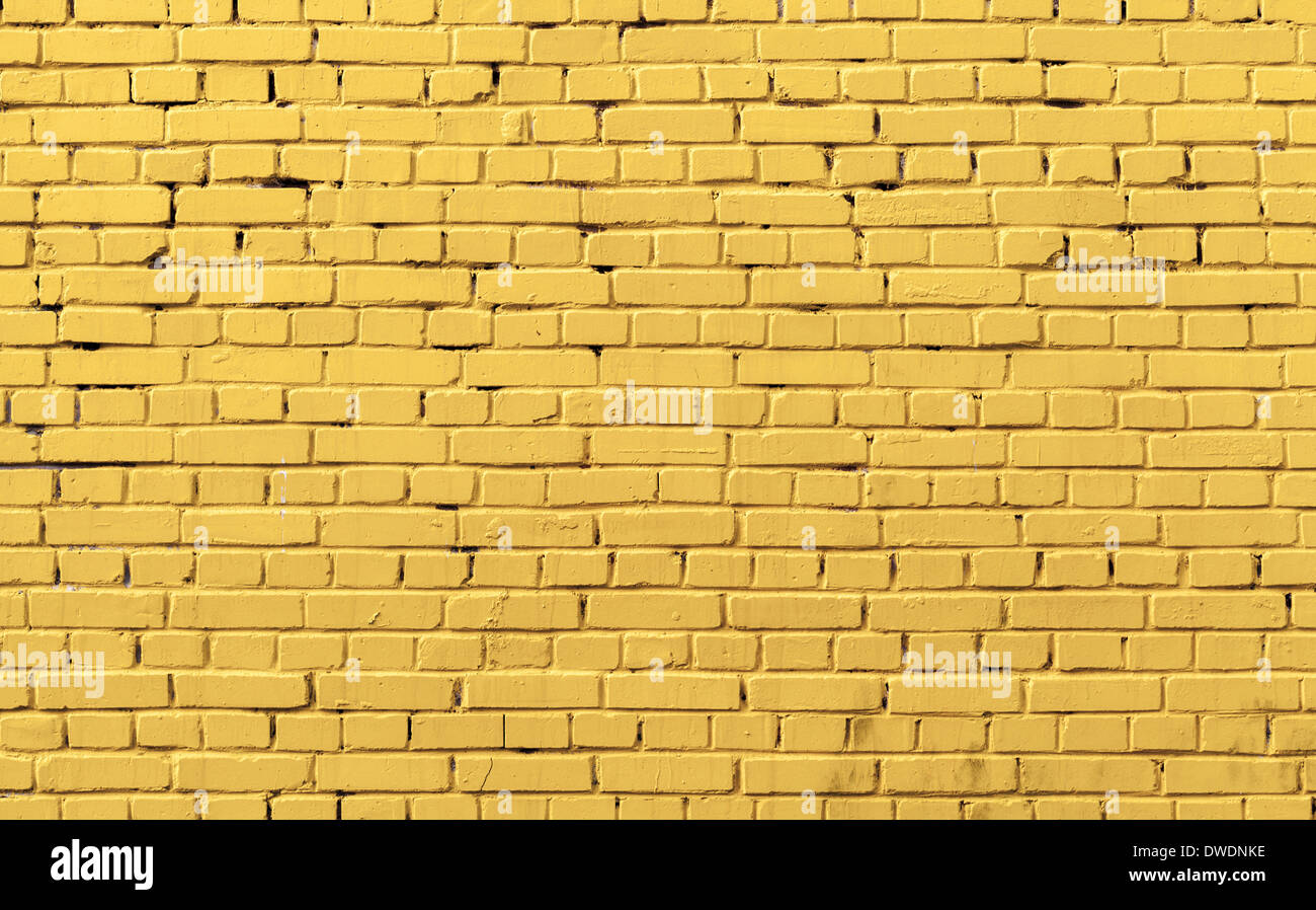 Yellow brick wall pattern background photo texture Stock Photo