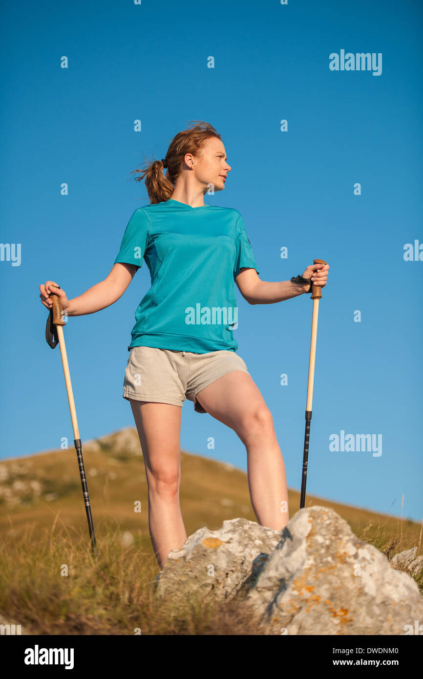Girl hiking on mountains Stock Photo Alamy