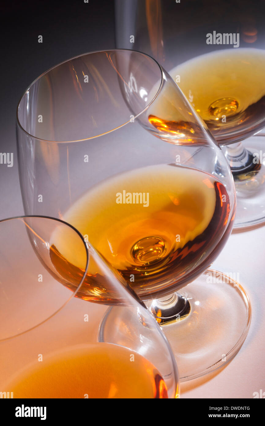 Line of Brandy snifters with French Brandy (Cognac) Stock Photo