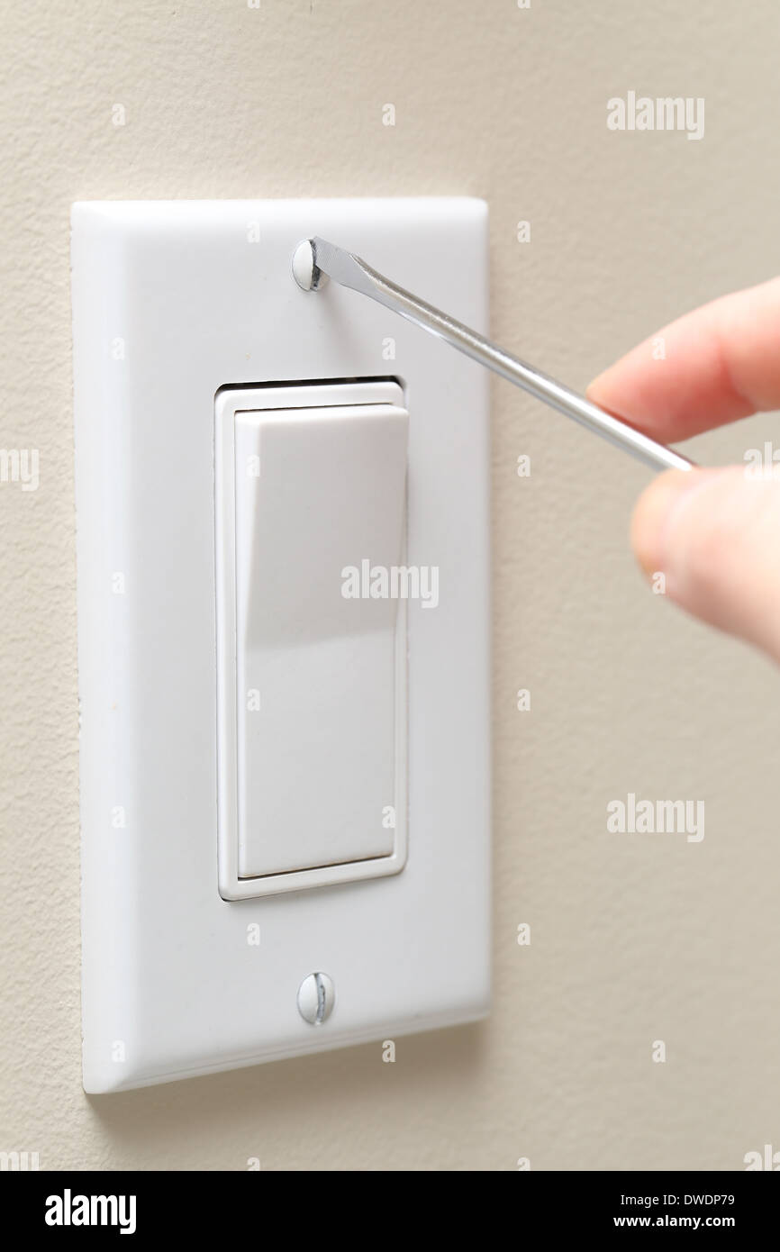 People repair a wall socket Stock Photo Alamy