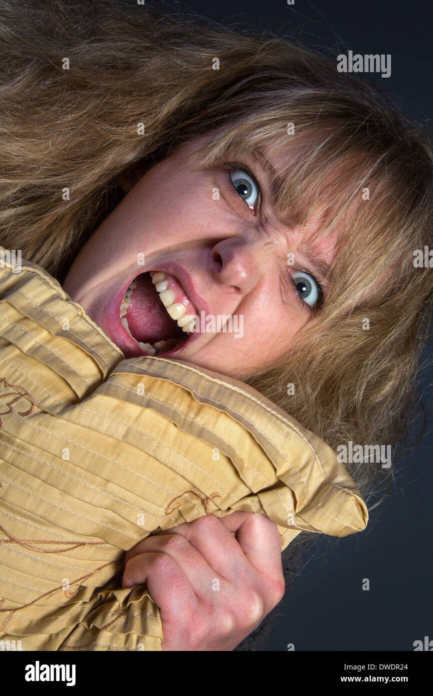 An hysterical young woman Stock Photo