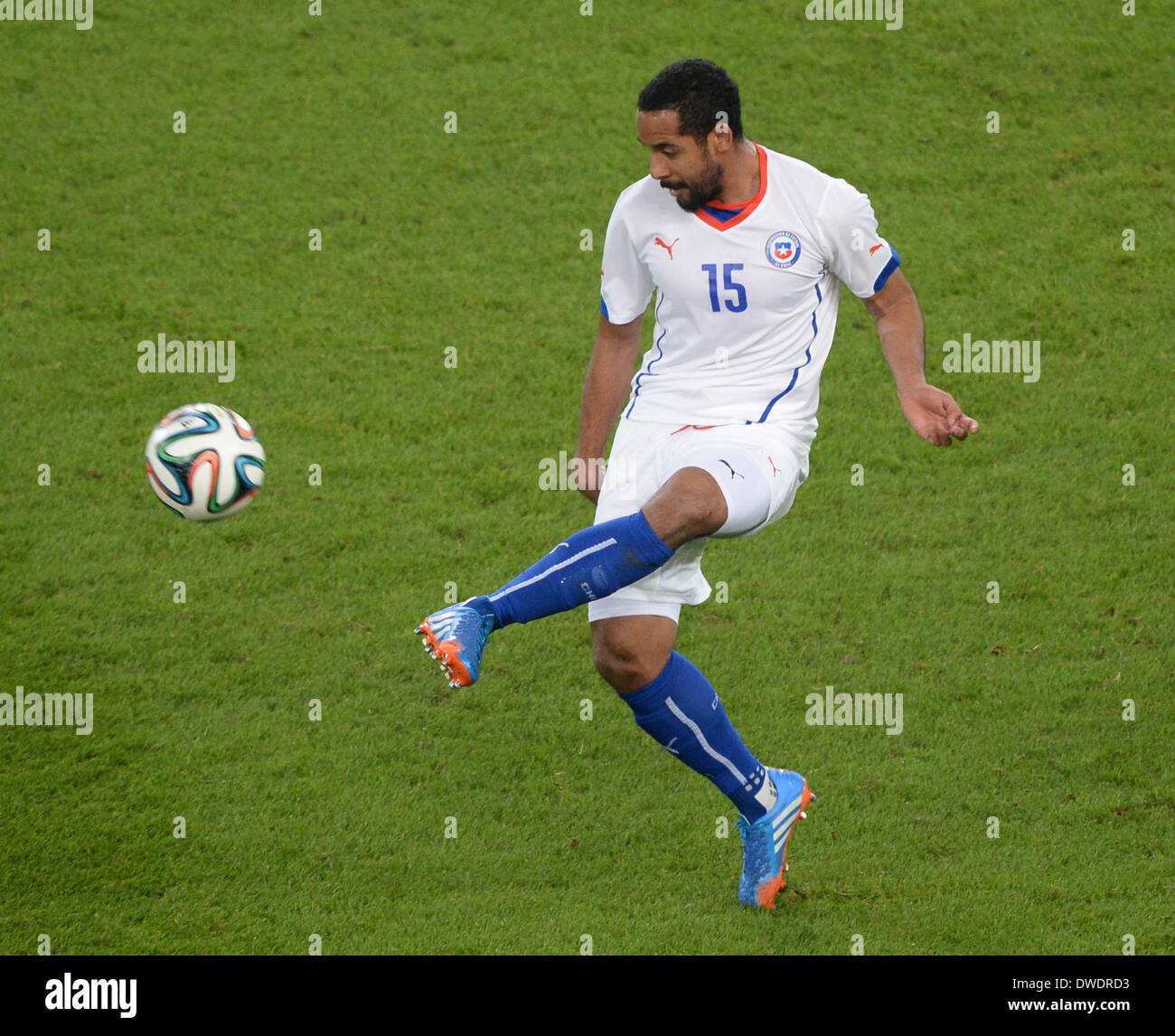 Stuttgart, Germany. 05th Mar, 2014. Chile's Jean Beausejour kicks the ball during the international friendly match between Germany and Chile at Mercedes-Benz-Arena in Stuttgart, Germany, 05 March 2014. Photo: Patrick Seeger/dpa/Alamy Live News Stock Photo