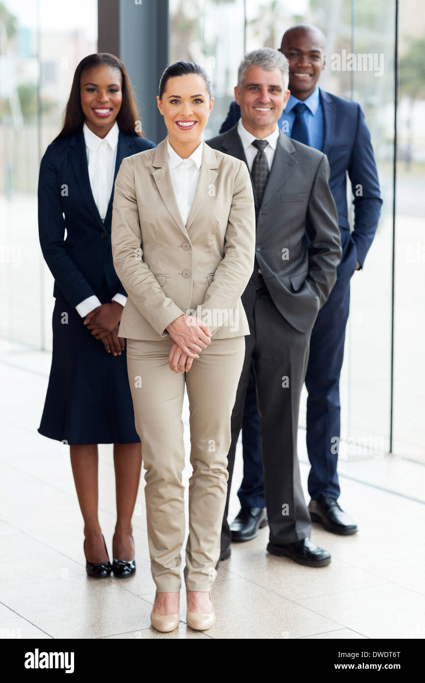 group of successful businesspeople standing in office Stock Photo - Alamy