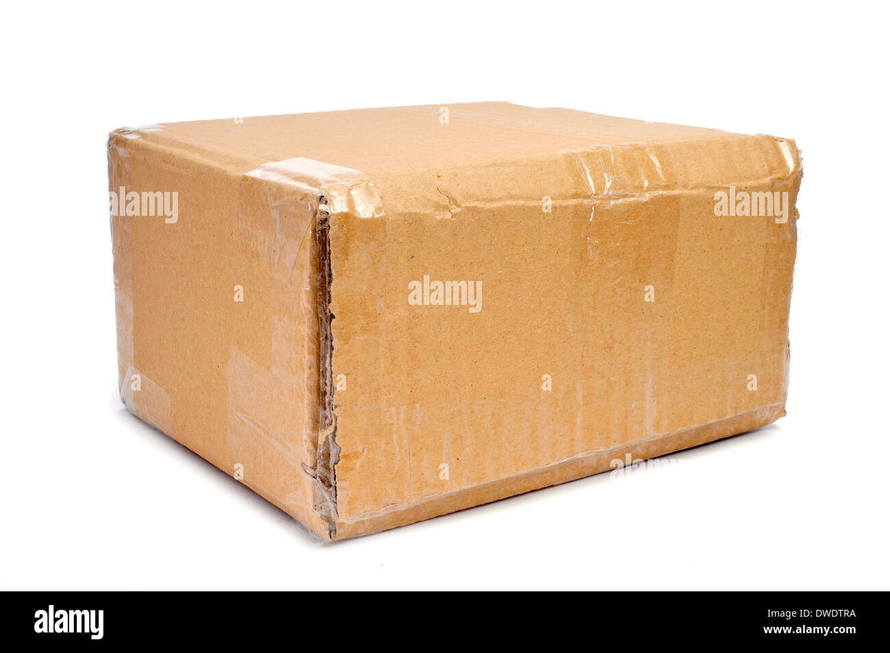 a brown cardboard box sealed with tape on a white background Stock