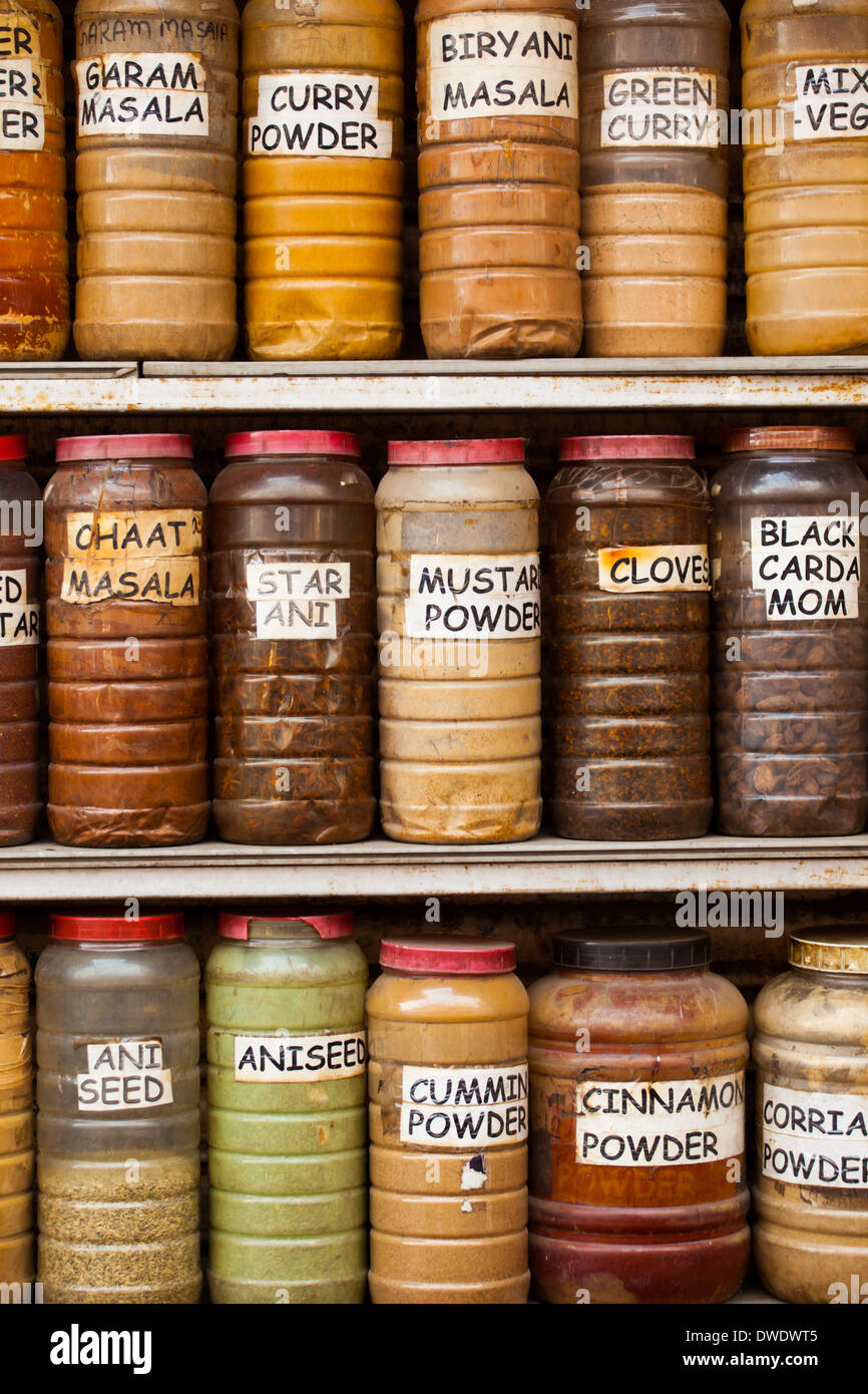 Jars of herbs and powders in a indian spice shop Stock Photo Alamy