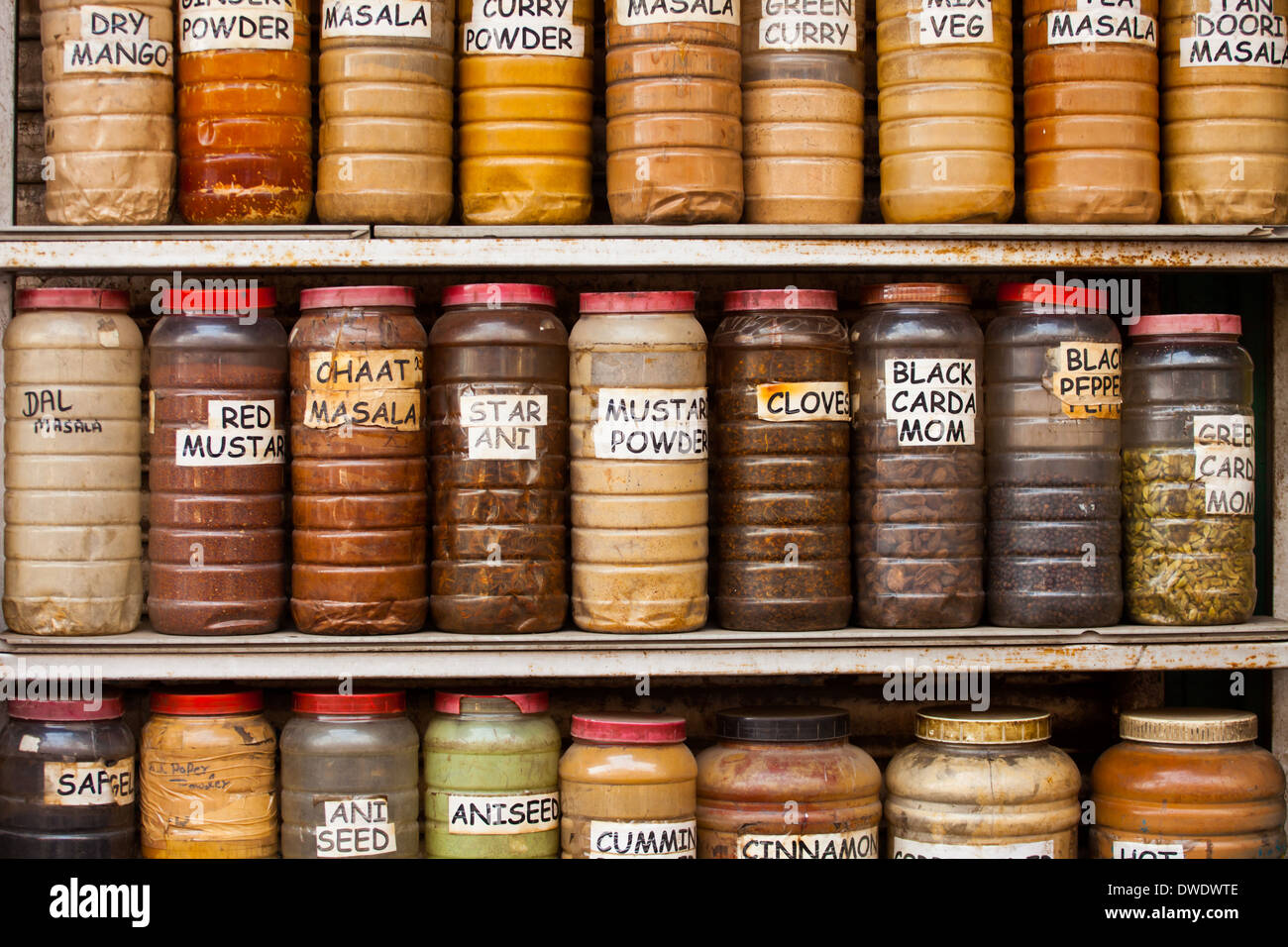 Jars of herbs and powders in a indian spice shop Stock Photo Alamy