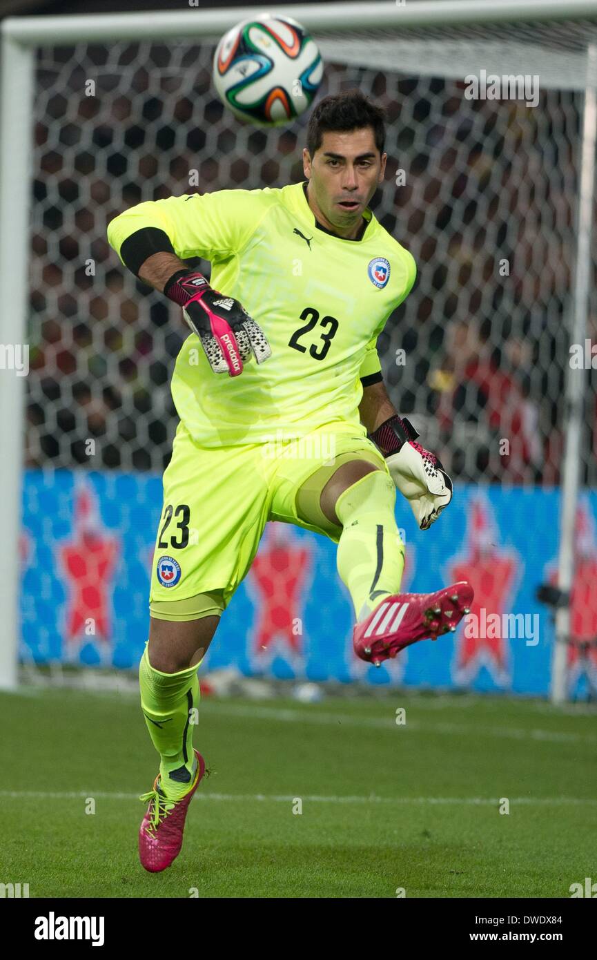 Stuttgart, Germany. 05th Mar, 2014. Chile's goalkeeper Johnny Herrera kicks the ball during the international friendly match between Germany and Chile at Mercedes-Benz-Arena in Stuttgart, Germany, 05 March 2014. Photo: Sebastian Kahnert/dpa/Alamy Live News Stock Photo
