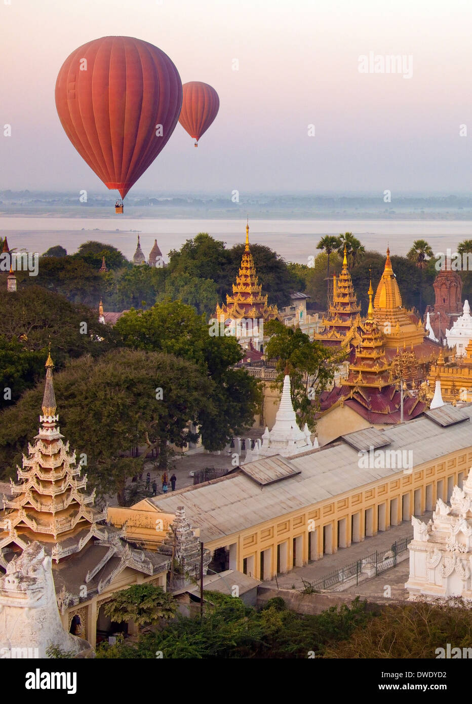 Hot Air Balloons by temples near the Shwezigon Pagoda - Bagan in Myanmar (Burma) Stock Photo