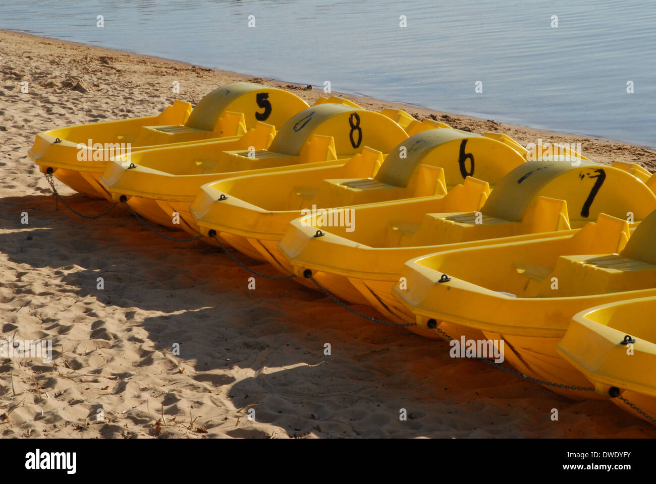 Pedal boats on beach Stock Photo Alamy
