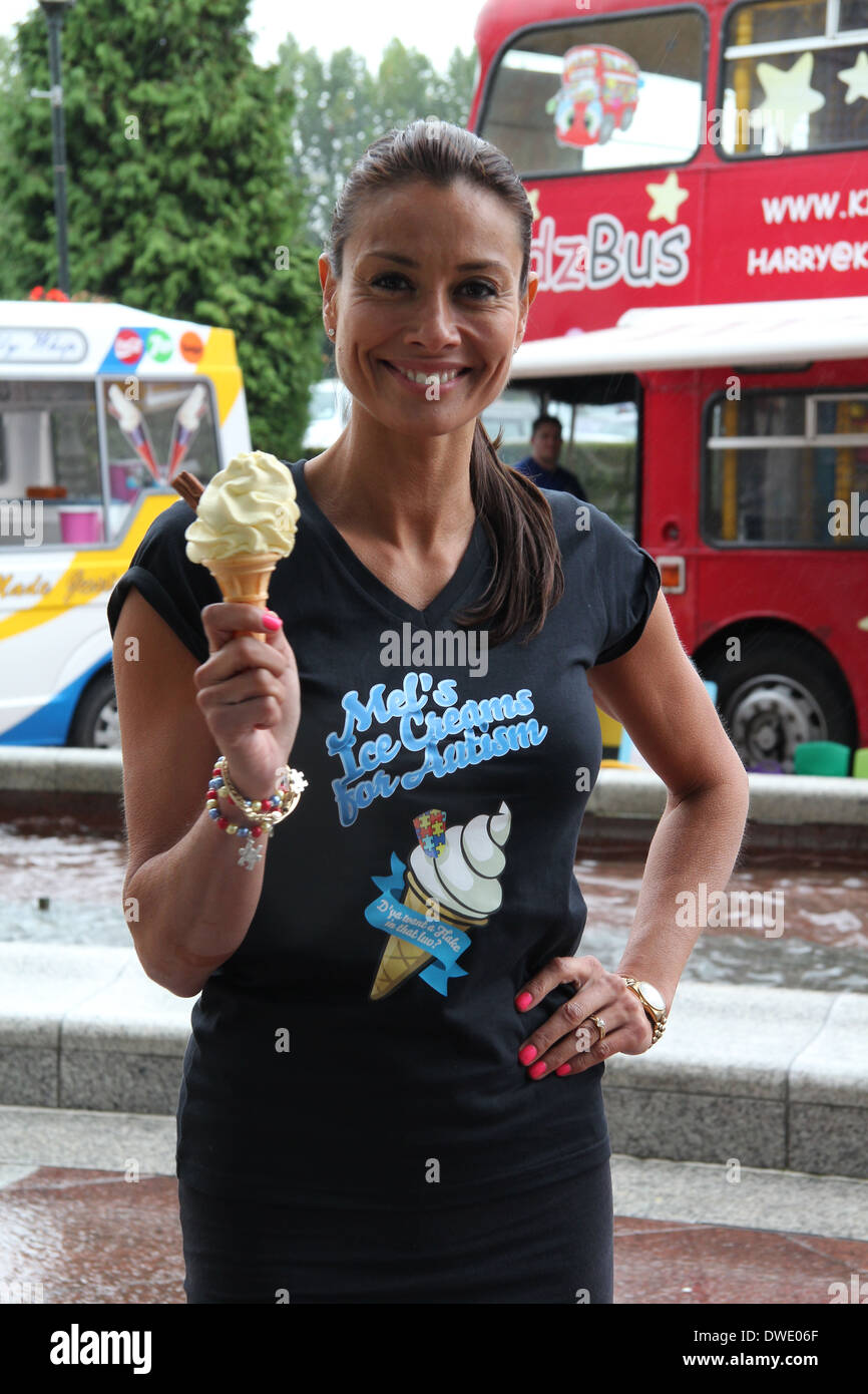 Melanie Sykes serves ice cream at the Trafford Centre as part of a UK tour  in an icecream van to raise money for autism Stock Photo - Alamy