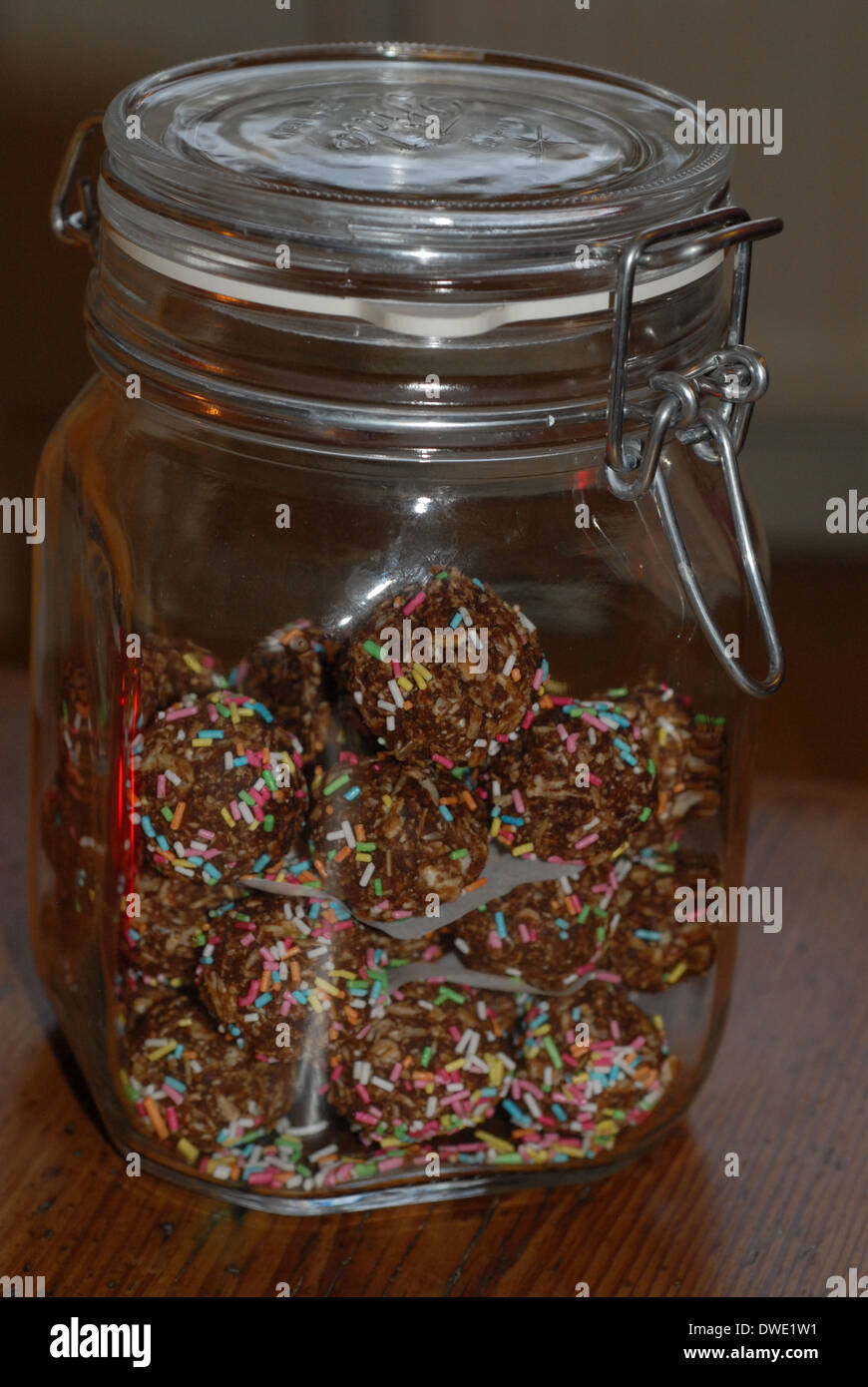 Homemade chocolate sweets in glass jar. Stock Photo