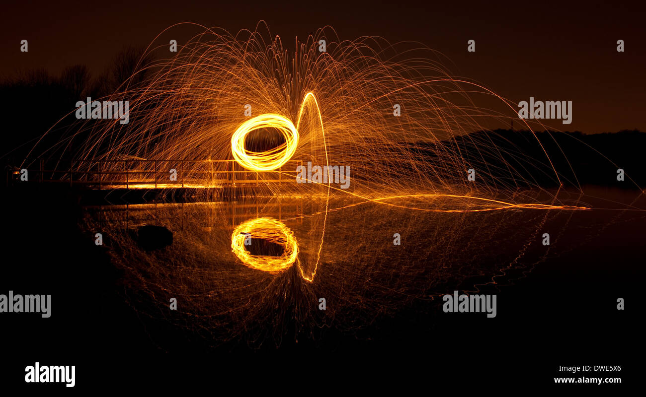 Long exposure wire wool spinning in Nottinghamshire, England UK Stock