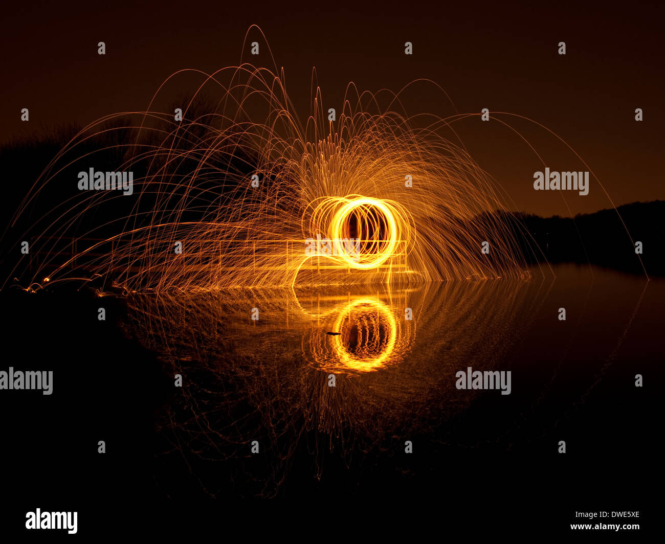 Long exposure wire wool spinning in Nottinghamshire, England UK Stock