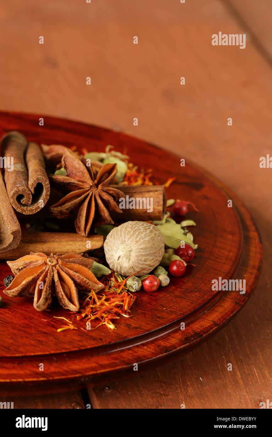 various spices (nutmeg, cinnamon, star anise, saffron, pepper, cardamom