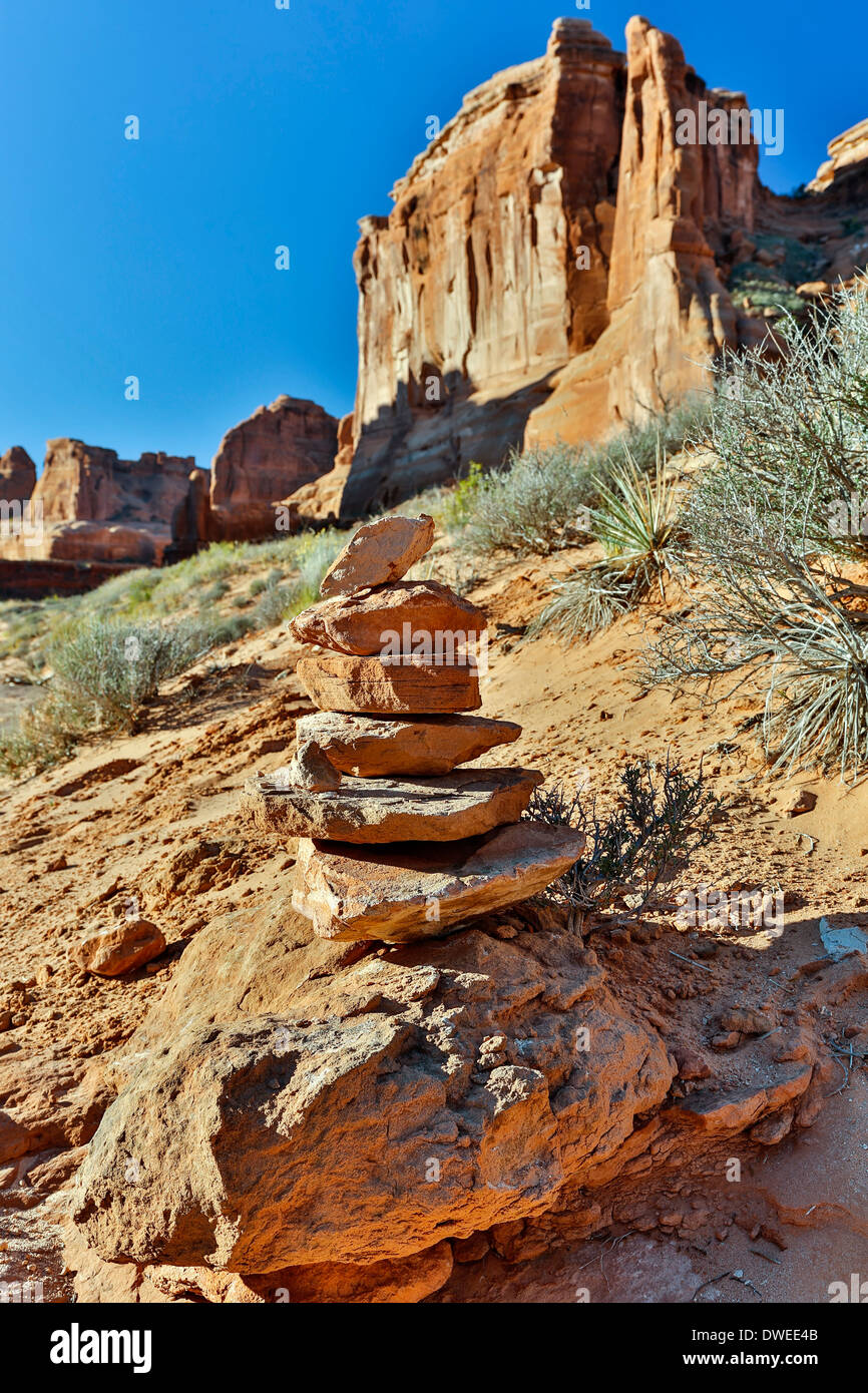 Cairn and sandstone rock formation , Park Avenue Trail, Arches National Park, Moab, Utah USA Stock Photo