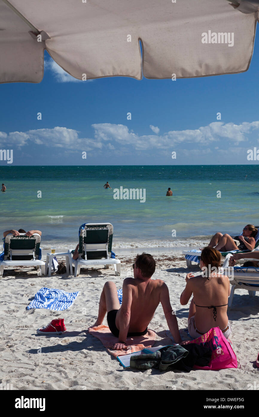 Key West, Florida - Tourists on South Beach, the southernmost beach in the continental United States. Stock Photo