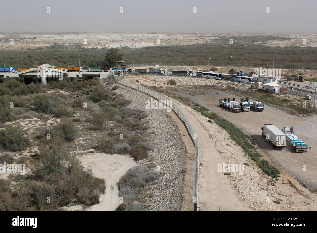 Trucks waiting to pass through Israeli checkpoint after crossing Allenby Bridge also known as The King Hussein Bridge in the Jordan valley Israel Stock Photo Alamy