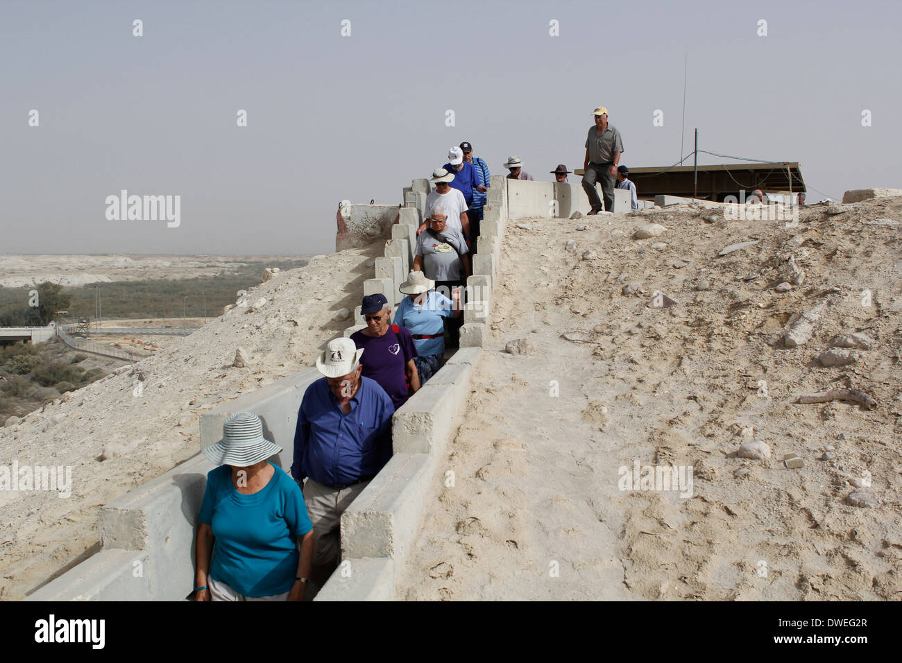 Israeli civilians walking on top of an Israeli military post next to Allenby Bridge also known as The King Hussein bridge crossing point between Israel and Jordan at the Jordan Valley Stock Photo