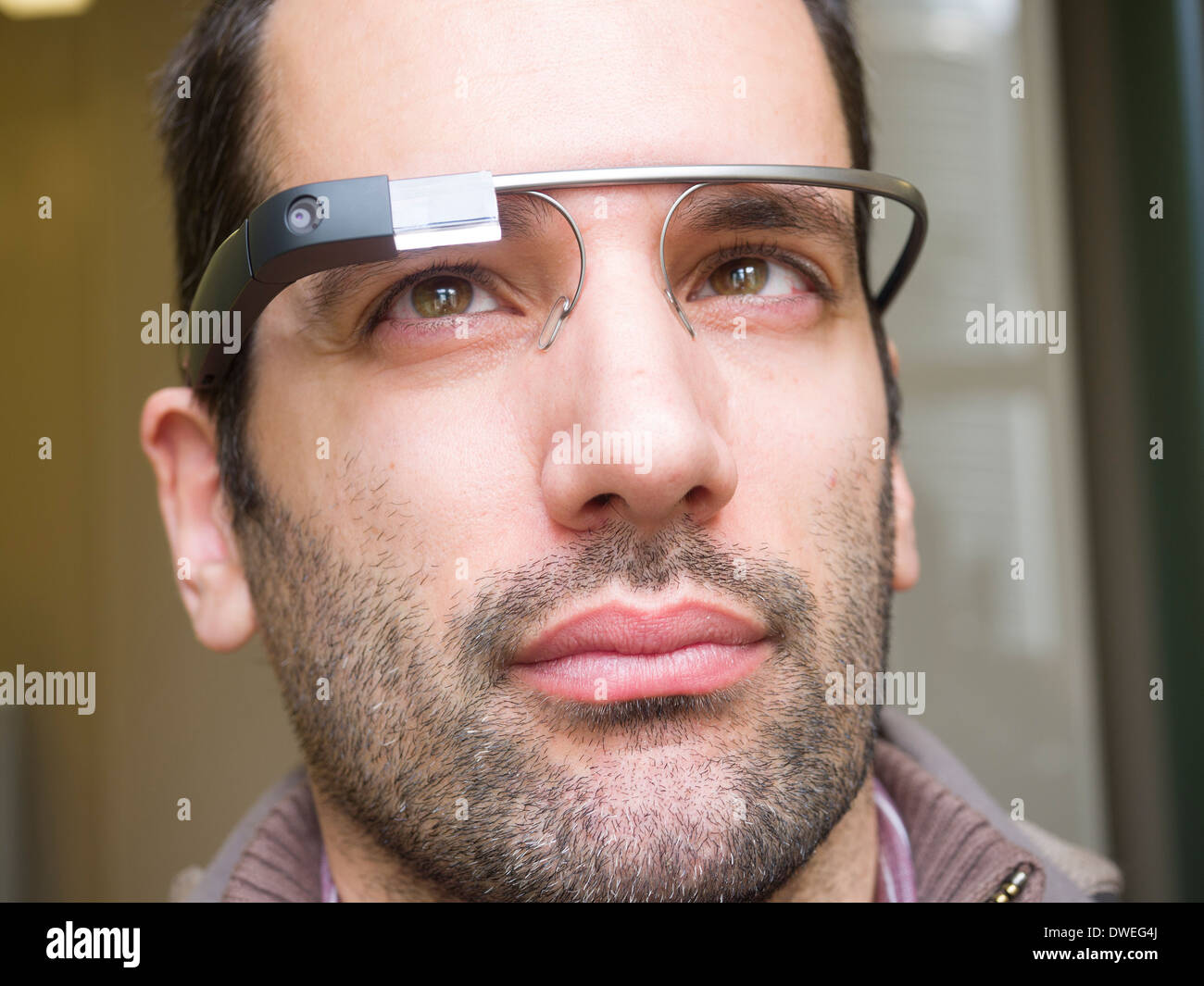 Young man wearing Google Glass Stock Photo