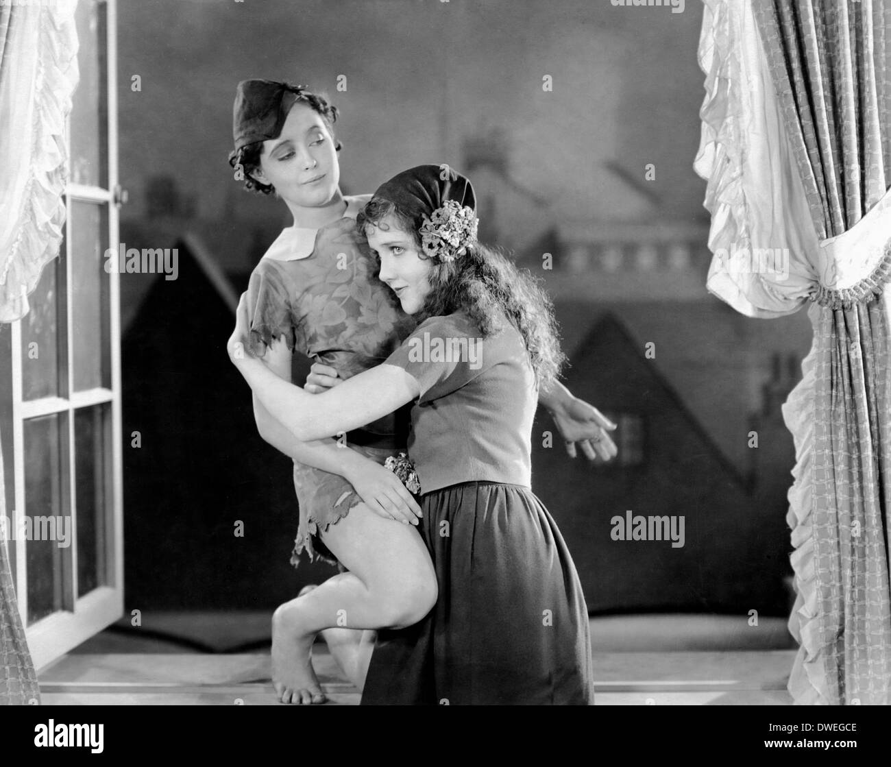 Betty Bronson and Mary Brian, on-set of the Silent Film, 'Peter Pan' directed by Herbert Brenon, 1924 Stock Photo