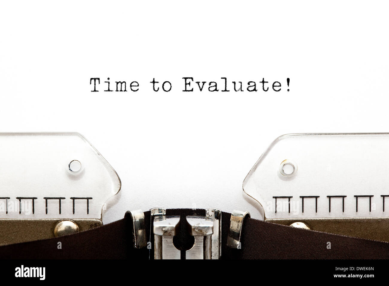 Time to Evaluate printed on an old typewriter. Stock Photo
