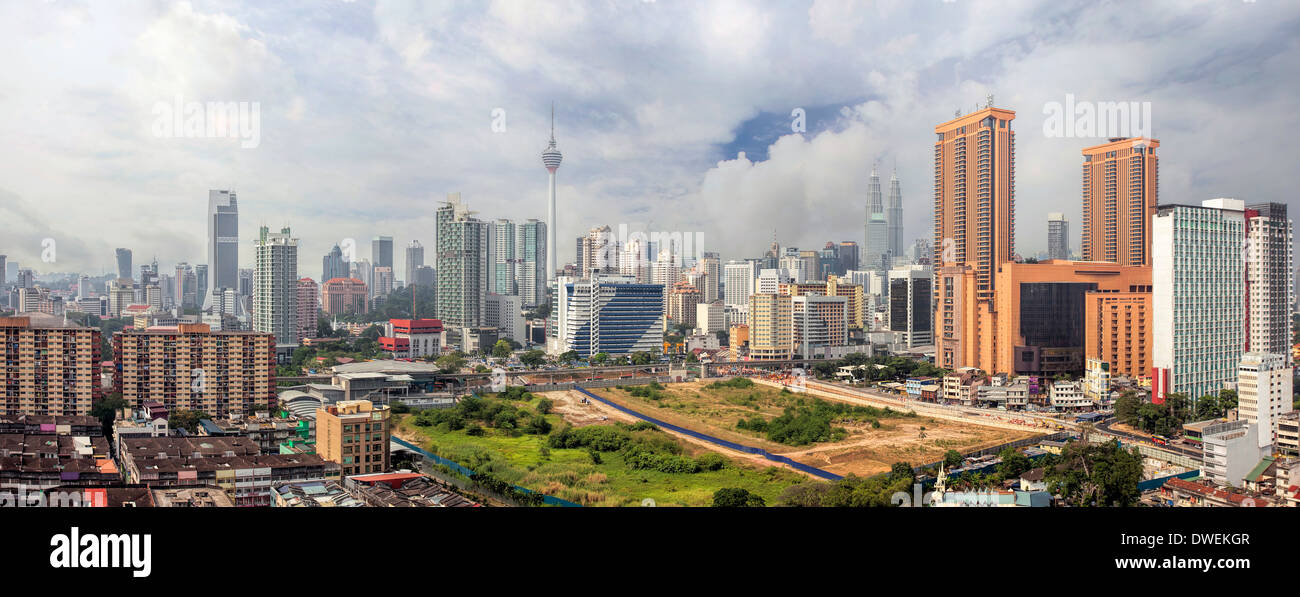 Kuala Lumpur Malaysia Central Cityscape with Old Neighborhood Houses Against Cloudy Blue Sky Panorama Stock Photo