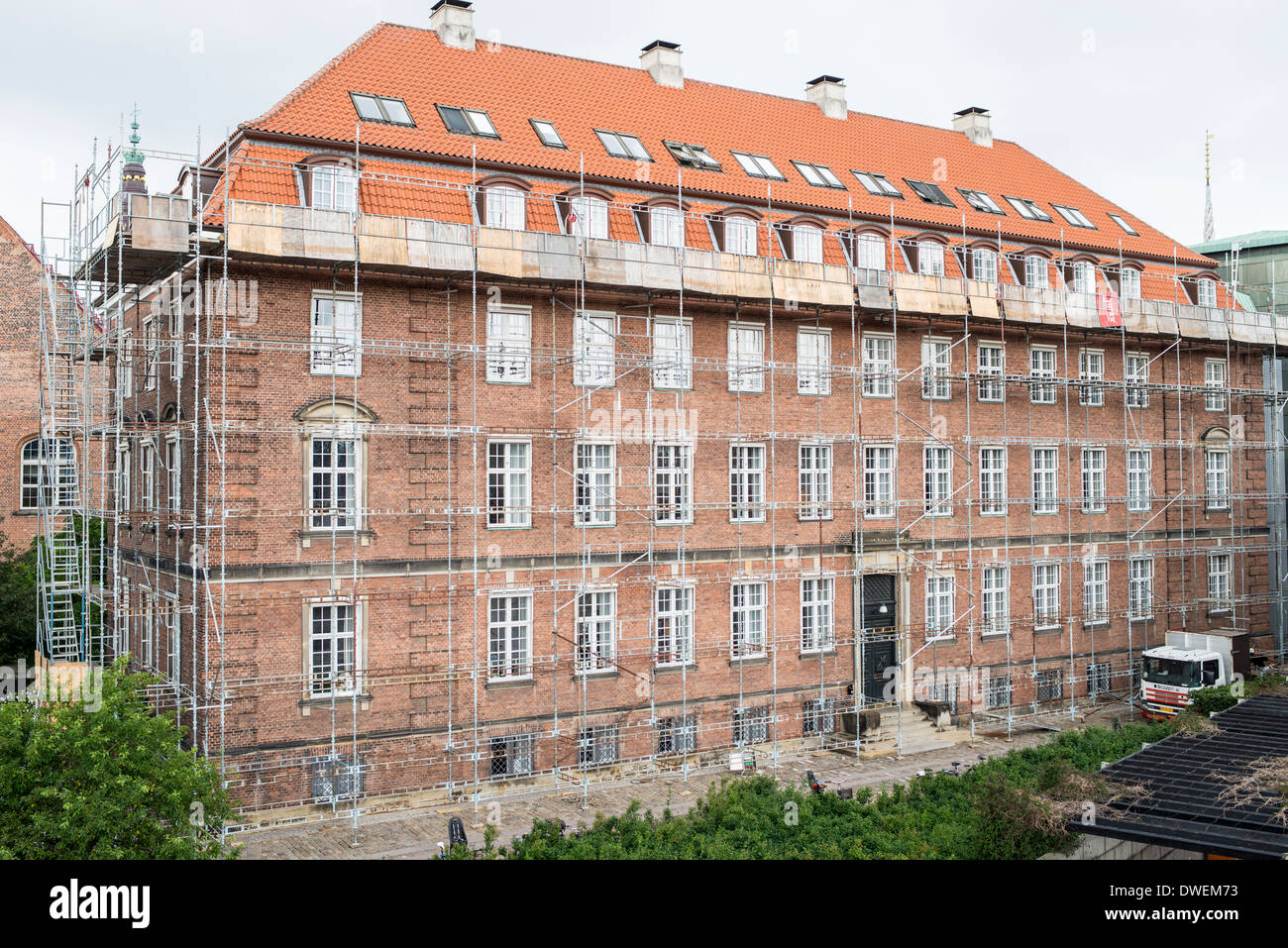 Scaffolding around a building under repair, Copenhagen Stock Photo