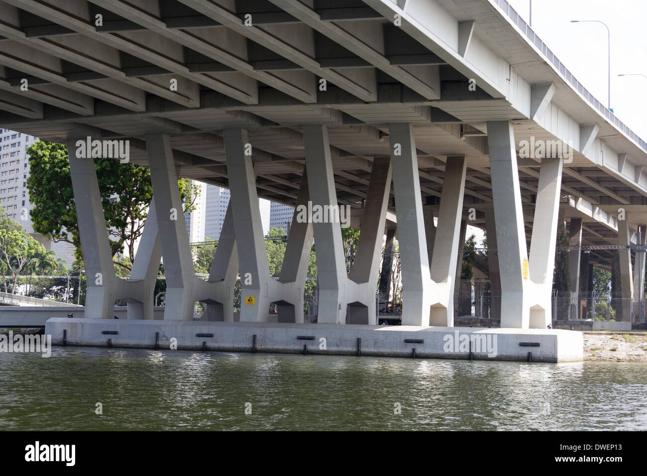 The support pillars of the Benjamin Sheares Bridge in Singapore and the water level. The bridge is right next to the Marina Bay Stock Photo