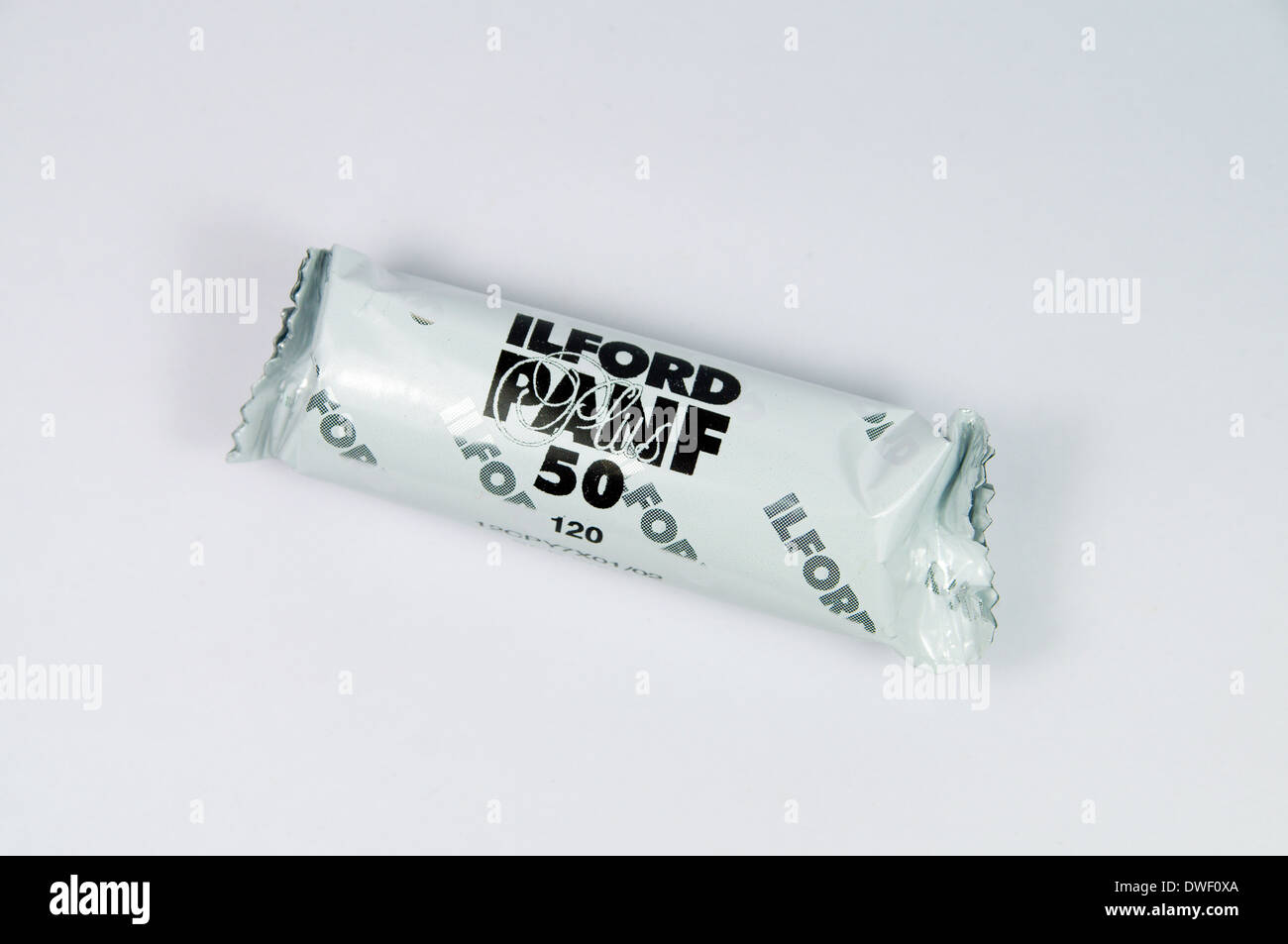 Roll of Ilford Pan F Black and White film in 120 roll film format. Stock Photo