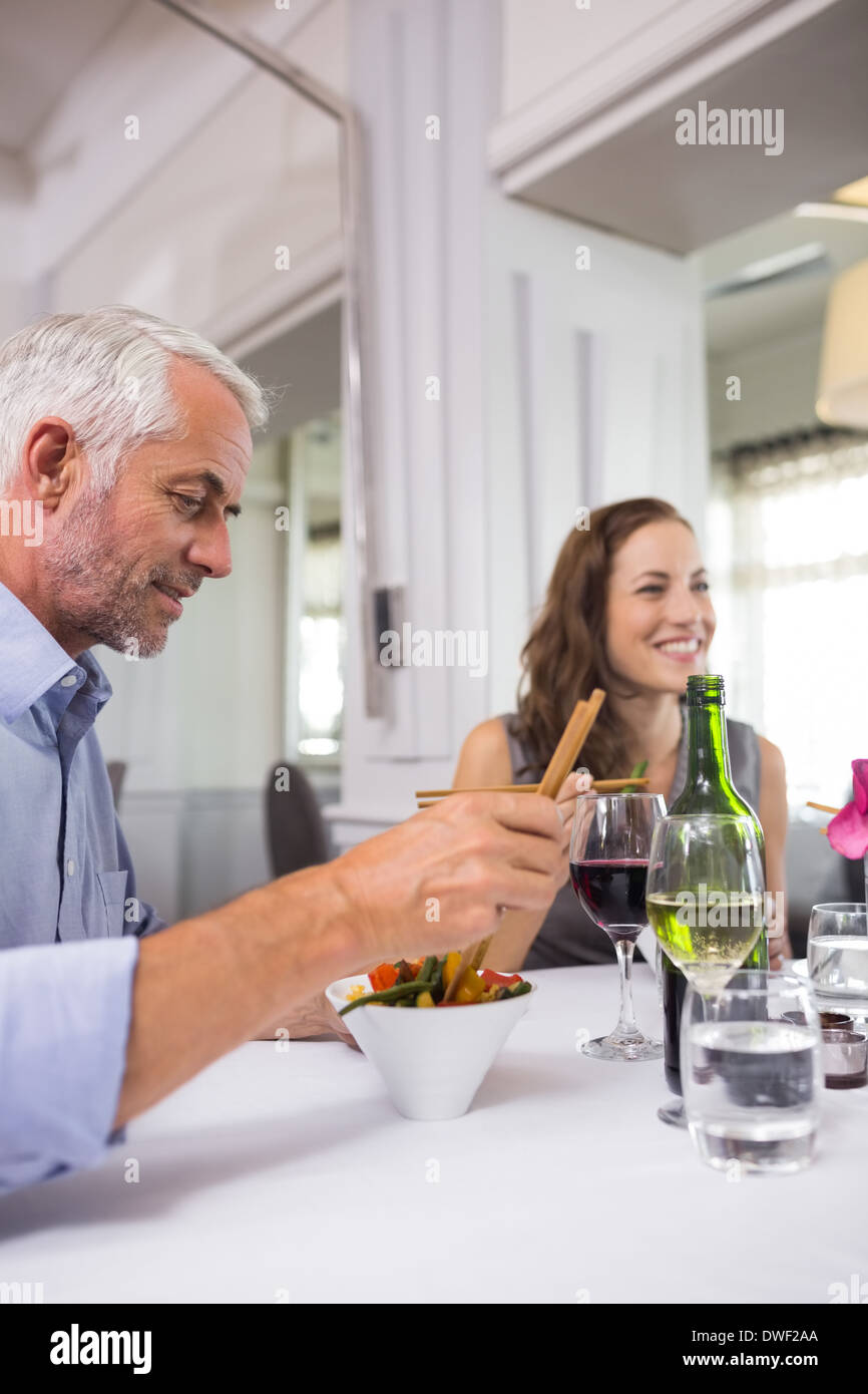 Business colleagues around dining table in restaurant Stock Photo