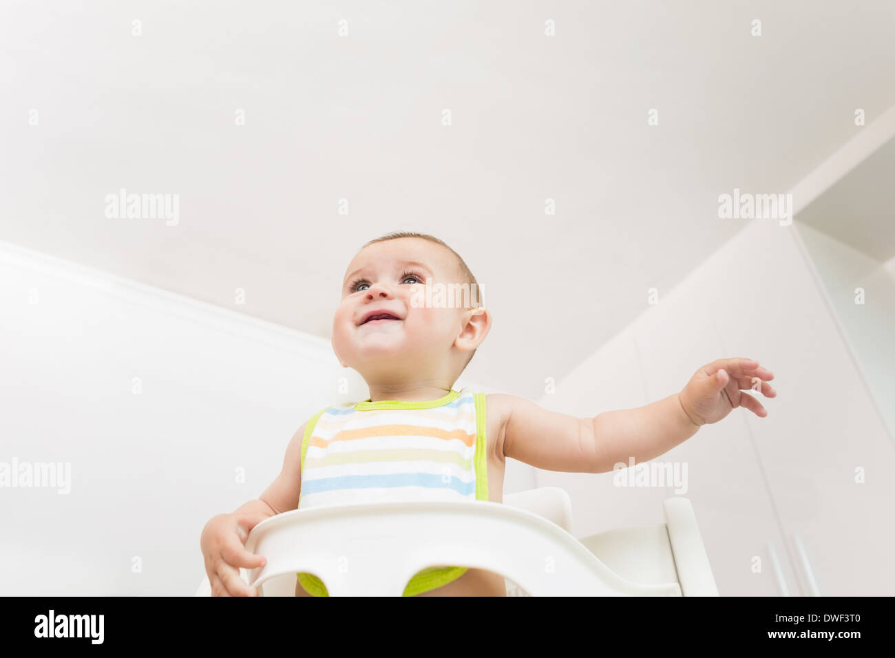 Happy baby wearing bib Stock Photo Alamy