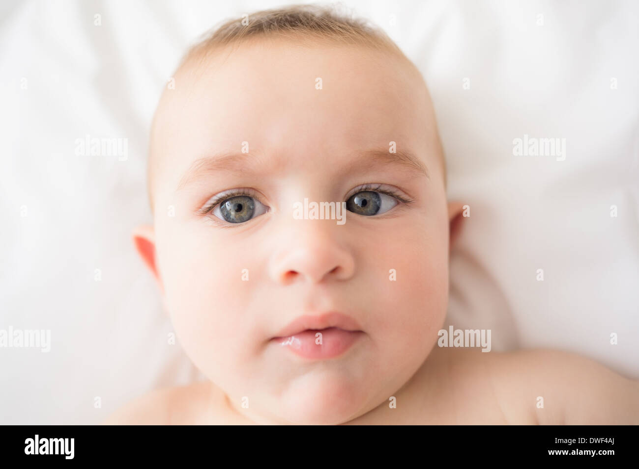 Adorable Baby Boy Lying In Bed Stock Photo Alamy